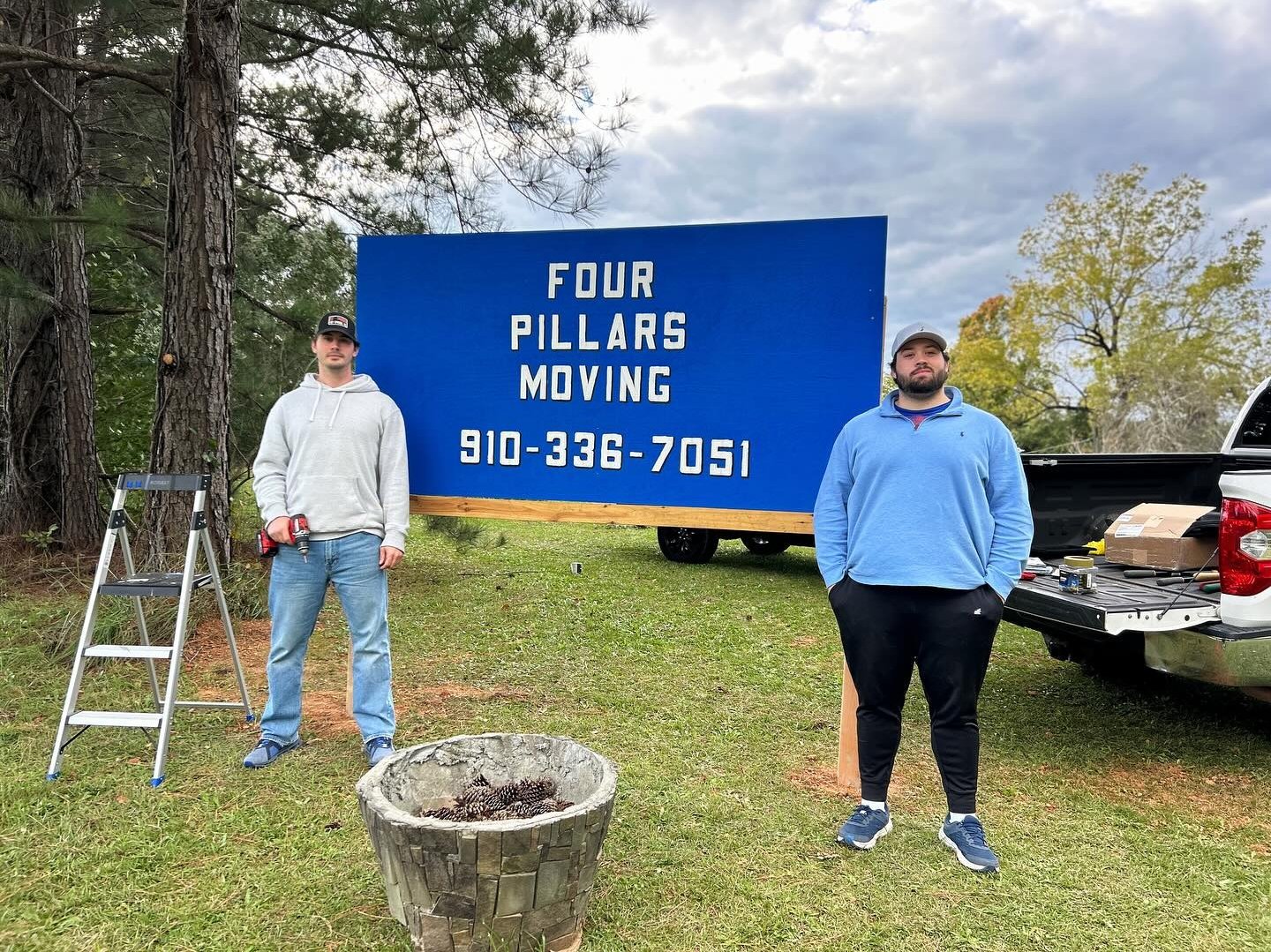 Four Pillars Moving team members on a move